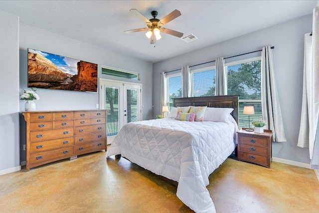 141 N Buckhorn Dr, Bastrop, TX 78602 - bedroom with access to exterior, french doors, baseboards, and concrete flooring