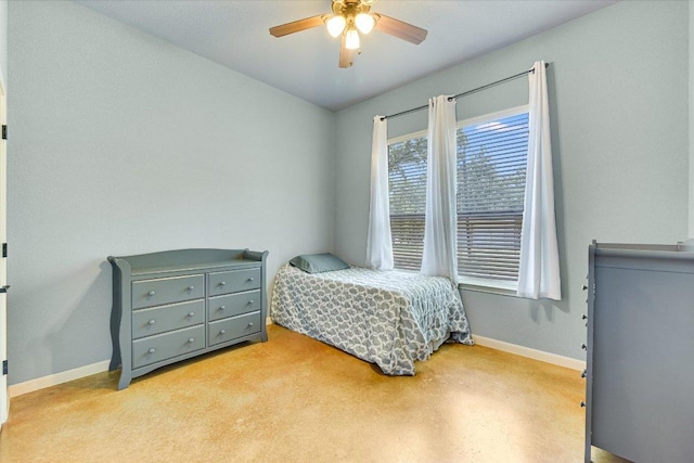 141 N Buckhorn Dr, Bastrop, TX 78602 - bedroom featuring baseboards and a ceiling fan