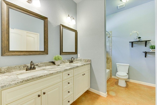141 N Buckhorn Dr, Bastrop, TX 78602 - bathroom with double vanity, toilet, tub / shower combination, and baseboards