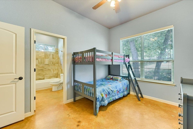 141 N Buckhorn Dr, Bastrop, TX 78602 - bedroom with baseboards, connected bathroom, and a ceiling fan