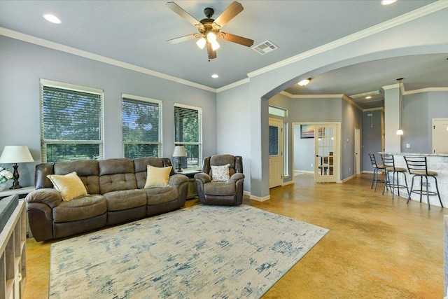 141 N Buckhorn Dr, Bastrop, TX 78602 - living area featuring arched walkways, a ceiling fan, finished concrete floors, recessed lighting, and baseboards