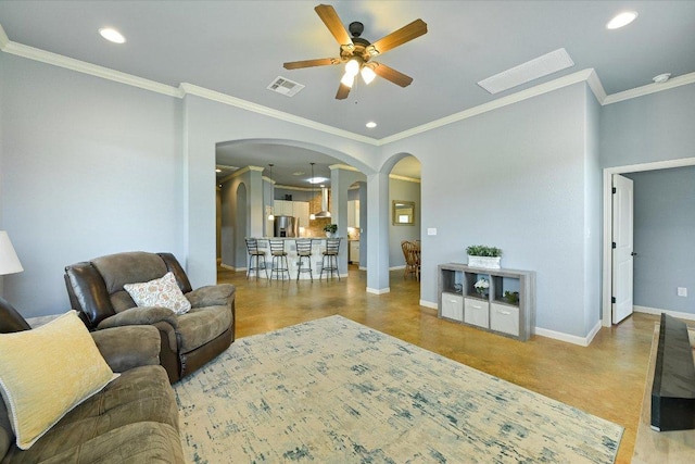 141 N Buckhorn Dr, Bastrop, TX 78602 - living area featuring arched walkways, a ceiling fan, crown molding, recessed lighting, and baseboards