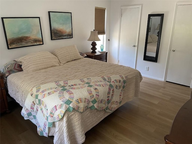 9206 Robins Nest Ln, Austin, TX 78729 - bedroom featuring wood finished floors and baseboards