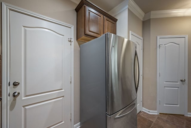 11000 Anderson Mill Rd Unit 96, Austin, TX 78750 - kitchen with freestanding refrigerator, ornamental molding, and baseboards