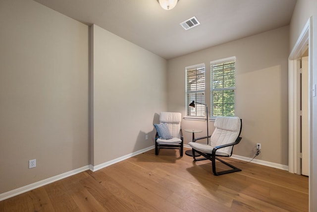 11000 Anderson Mill Rd Unit 96, Austin, TX 78750 - sitting room with wood finished floors and baseboards