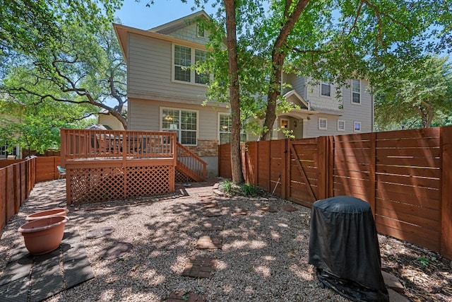 11000 Anderson Mill Rd Unit 96, Austin, TX 78750 - back of house with a fenced backyard, a deck, and a gate