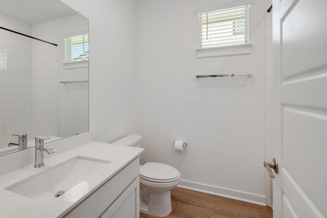 204 Shawi Pass, Leander, TX 78641 - bathroom with wood finished floors, vanity, and a shower