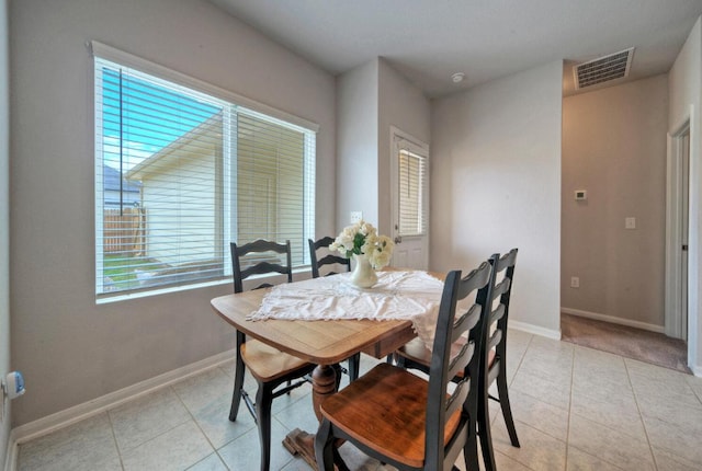 211 S Timber Brook Dr, Hutto, TX 78634 - dining room featuring baseboards and light tile patterned floors