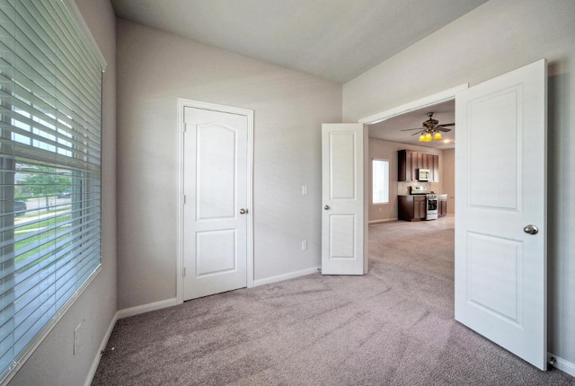 211 S Timber Brook Dr, Hutto, TX 78634 - unfurnished bedroom featuring light carpet