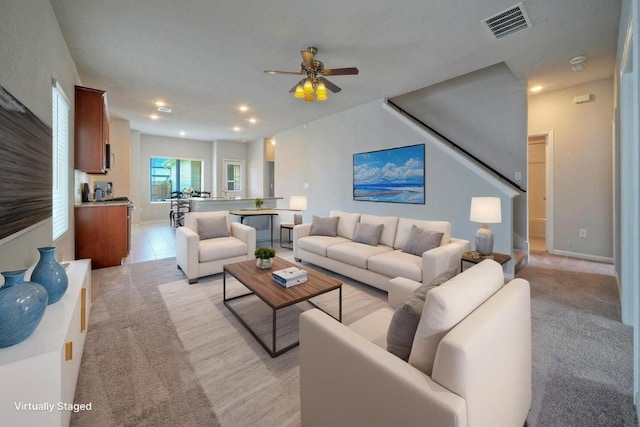 211 S Timber Brook Dr, Hutto, TX 78634 - living area featuring a ceiling fan, light carpet, and recessed lighting