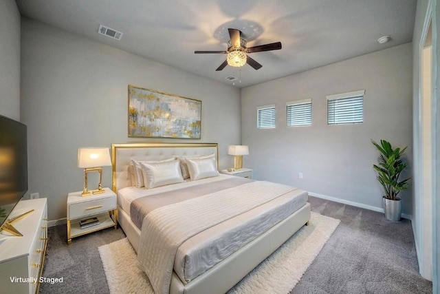 211 S Timber Brook Dr, Hutto, TX 78634 - carpeted bedroom with baseboards and ceiling fan