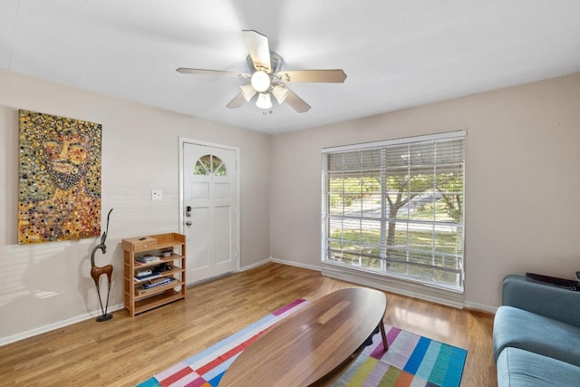 6805 Tulane Dr, Austin, TX 78723 - entryway with wood finished floors, baseboards, and a ceiling fan
