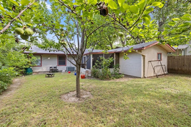6805 Tulane Dr, Austin, TX 78723 - back of house featuring central AC unit and a sunroom