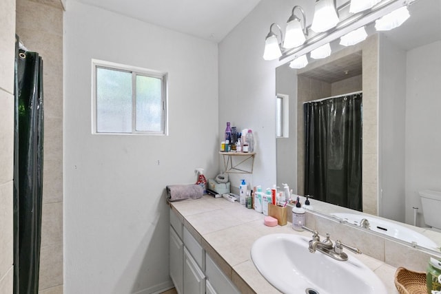 6805 Tulane Dr, Austin, TX 78723 - full bath featuring toilet, vanity, and a shower with shower curtain