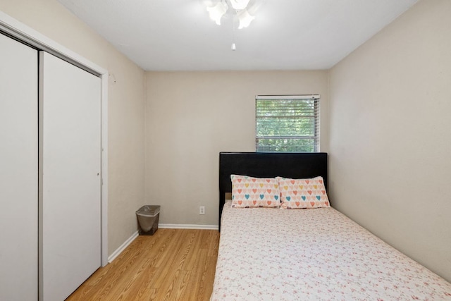6805 Tulane Dr, Austin, TX 78723 - bedroom featuring light wood-type flooring, a closet, and baseboards