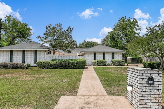 8600 Crest Ridge Cir, Austin, TX 78750 - view of front of property with brick siding and a shingled roof
