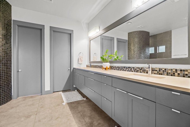 332 Rugged Earth Dr, Austin, TX 78737 - full bath with double vanity, decorative backsplash, and tile patterned flooring