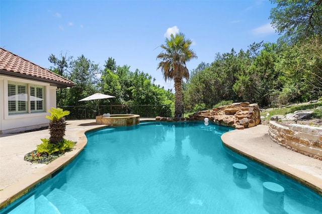 2404 University Club Dr, Austin, TX 78732 - view of pool with a pool with connected hot tub and a patio area