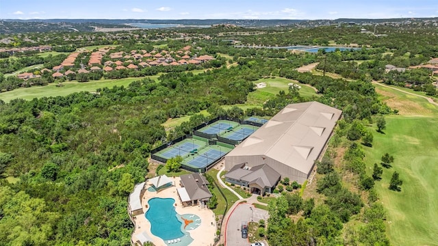 2404 University Club Dr, Austin, TX 78732 - aerial view of residential area with a pool area, a golf course, and a large body of water