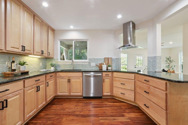 6029 Mount Bonnell Cv, Austin, TX 78731 - kitchen with stainless steel dishwasher, exhaust hood, light brown cabinetry, dark stone counters, and recessed lighting