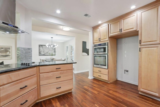 6029 Mount Bonnell Cv, Austin, TX 78731 - kitchen with light brown cabinetry, wall chimney exhaust hood, double oven, dark wood-style floors, and recessed lighting