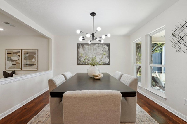 6029 Mount Bonnell Cv, Austin, TX 78731 - dining space with a chandelier and dark wood-style flooring