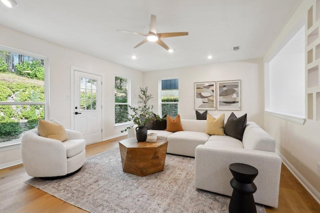 6029 Mount Bonnell Cv, Austin, TX 78731 - living room featuring wood finished floors, ceiling fan, and recessed lighting
