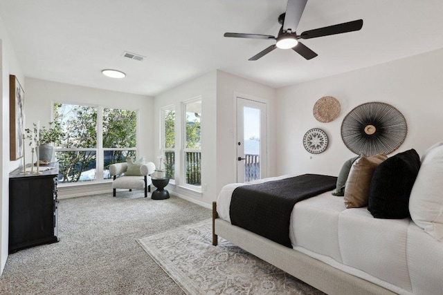 6029 Mount Bonnell Cv, Austin, TX 78731 - carpeted bedroom with a ceiling fan