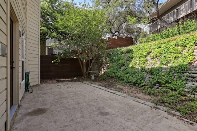 6029 Mount Bonnell Cv, Austin, TX 78731 - fenced backyard featuring a patio