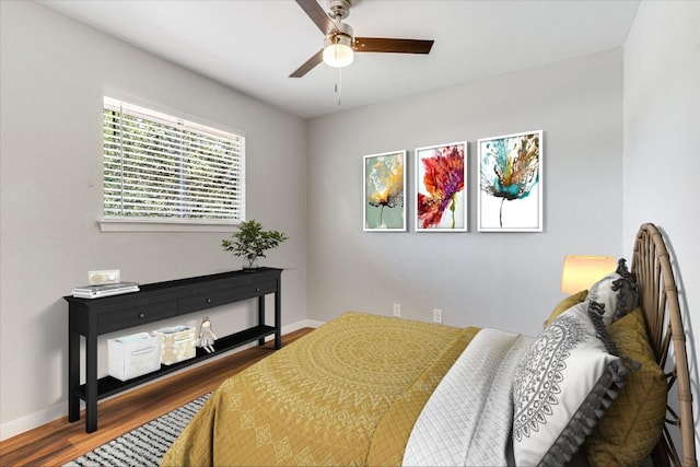1403 Terrapin Ct, Austin, TX 78746 - bedroom featuring wood finished floors, baseboards, and a ceiling fan