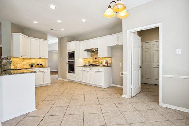 1252 Fall Creek Loop, Cedar Park, TX 78613 - kitchen featuring stainless steel appliances, decorative backsplash, recessed lighting, white cabinetry, and light tile patterned floors