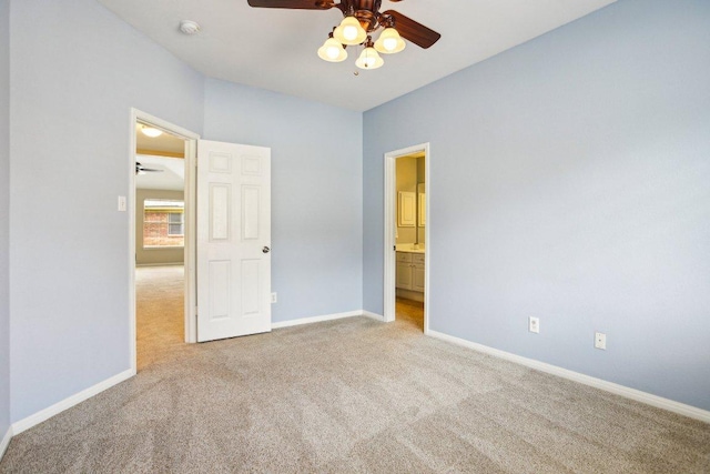 1252 Fall Creek Loop, Cedar Park, TX 78613 - unfurnished bedroom featuring carpet, ensuite bathroom, and a ceiling fan