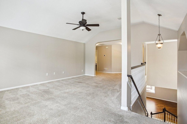 1252 Fall Creek Loop, Cedar Park, TX 78613 - carpeted empty room with vaulted ceiling, ceiling fan, arched walkways, and baseboards