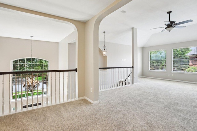 1252 Fall Creek Loop, Cedar Park, TX 78613 - carpeted spare room with ceiling fan, baseboards, and vaulted ceiling