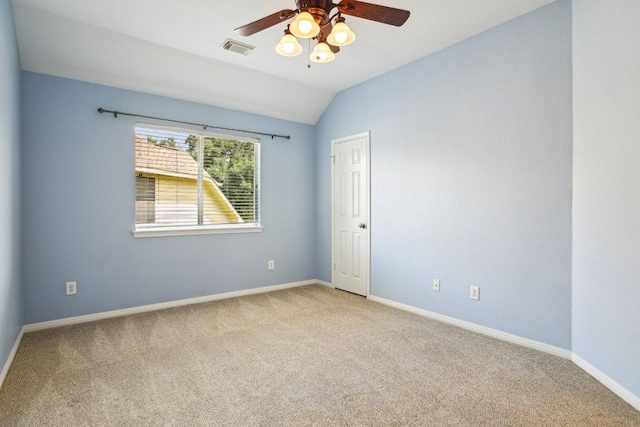 1252 Fall Creek Loop, Cedar Park, TX 78613 - spare room with light colored carpet, ceiling fan, vaulted ceiling, and baseboards