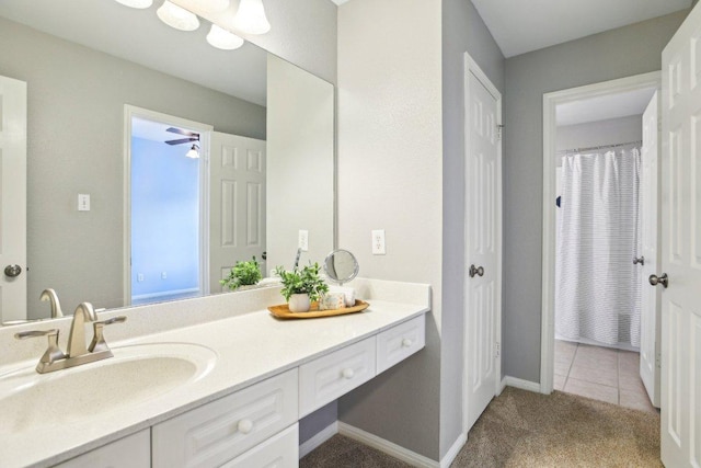 1252 Fall Creek Loop, Cedar Park, TX 78613 - full bathroom featuring vanity, a ceiling fan, tile patterned flooring, and baseboards