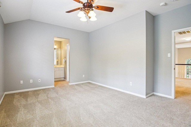 1252 Fall Creek Loop, Cedar Park, TX 78613 - unfurnished bedroom with light colored carpet, ensuite bathroom, vaulted ceiling, and ceiling fan