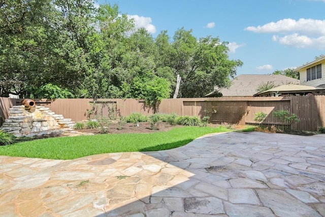 1252 Fall Creek Loop, Cedar Park, TX 78613 - fenced backyard featuring a patio