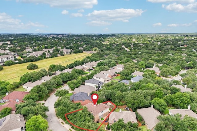 1252 Fall Creek Loop, Cedar Park, TX 78613 - aerial perspective of suburban area featuring property parcel outlined and a tree filled landscape