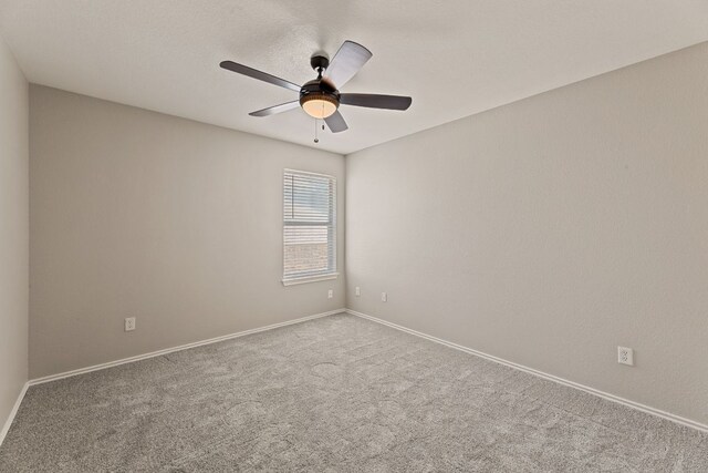 1129 Wigwam Dr, Leander, TX 78641 - empty room with a ceiling fan and carpet