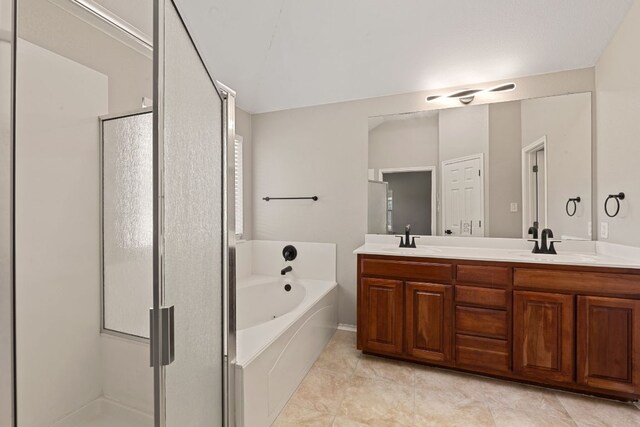 1129 Wigwam Dr, Leander, TX 78641 - full bathroom with a stall shower, a bath, and double vanity