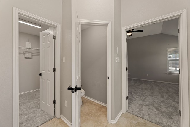 1129 Wigwam Dr, Leander, TX 78641 - hallway with light carpet and vaulted ceiling