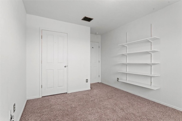 232 Wells Bnd, Hutto, TX 78634 - unfurnished bedroom featuring carpet and baseboards