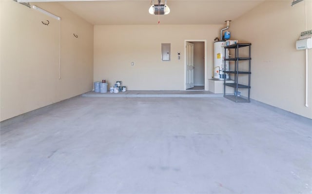 232 Wells Bnd, Hutto, TX 78634 - garage featuring electric panel, water heater, and a garage door opener
