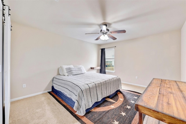 107 Denton Dr, Hutto, TX 78634 - carpeted bedroom with baseboards and a ceiling fan