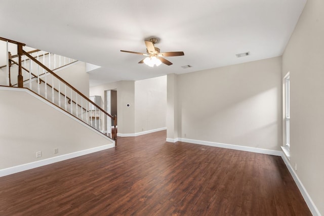 2308 Falcon Dr, Round Rock, TX 78681 - unfurnished living room featuring wood finished floors, a ceiling fan, and stairway