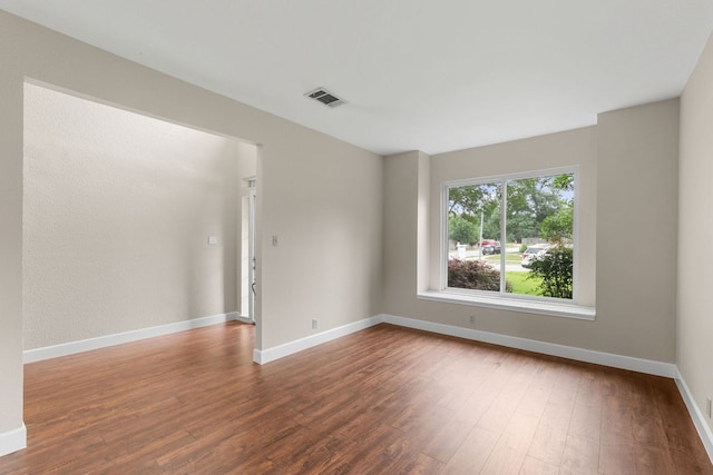 2308 Falcon Dr, Round Rock, TX 78681 - spare room featuring wood finished floors and baseboards