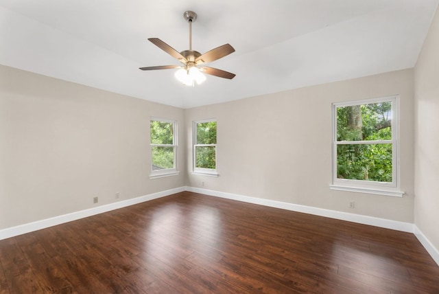 2308 Falcon Dr, Round Rock, TX 78681 - empty room featuring plenty of natural light, dark wood-style flooring, baseboards, and a ceiling fan