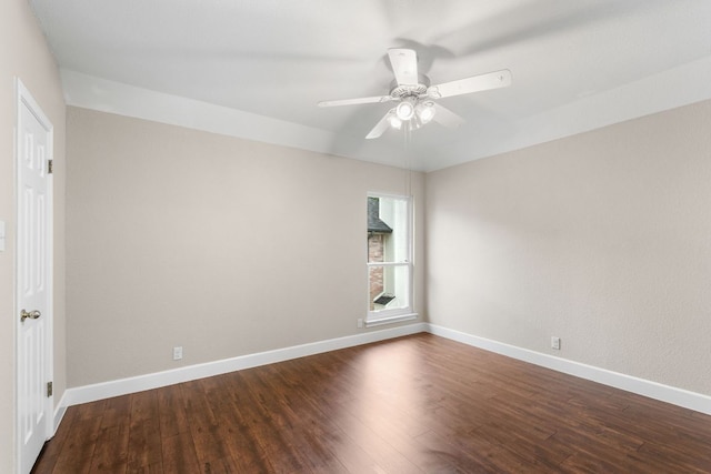 2308 Falcon Dr, Round Rock, TX 78681 - spare room with dark wood-style floors, a ceiling fan, and baseboards