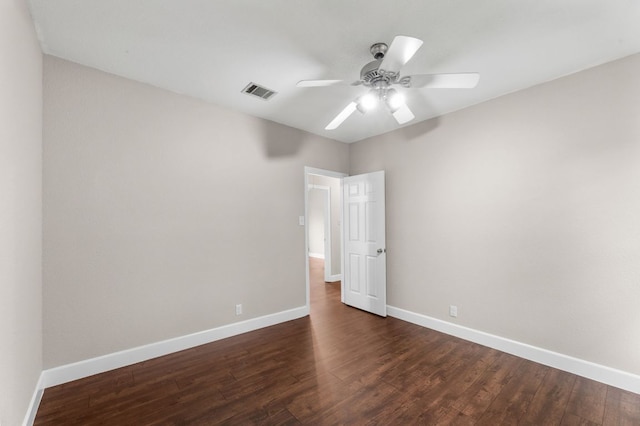2308 Falcon Dr, Round Rock, TX 78681 - unfurnished room featuring ceiling fan, baseboards, and dark wood-type flooring